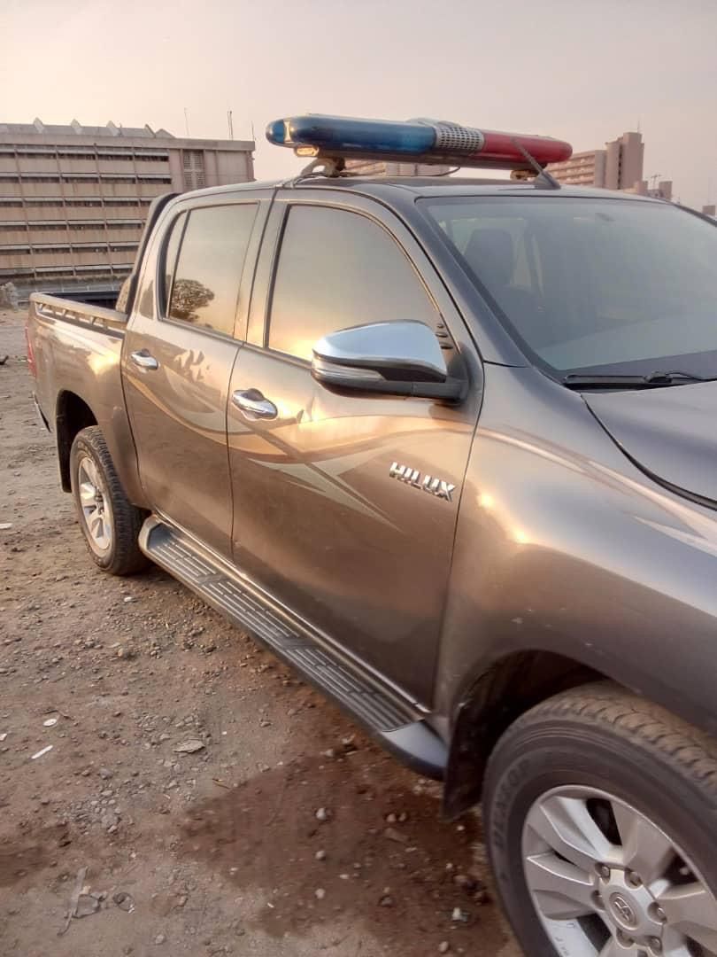 Toyota Hilux escort truck with light bar